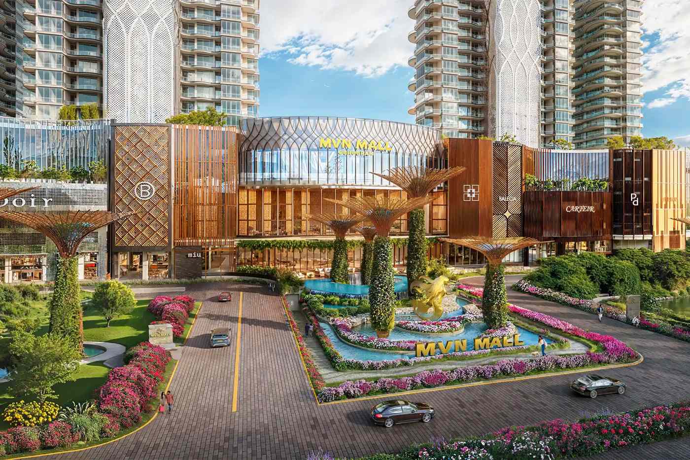 “Grand entrance of MVN Mall with landscaped gardens, fountain feature, and surrounding high-rise towers